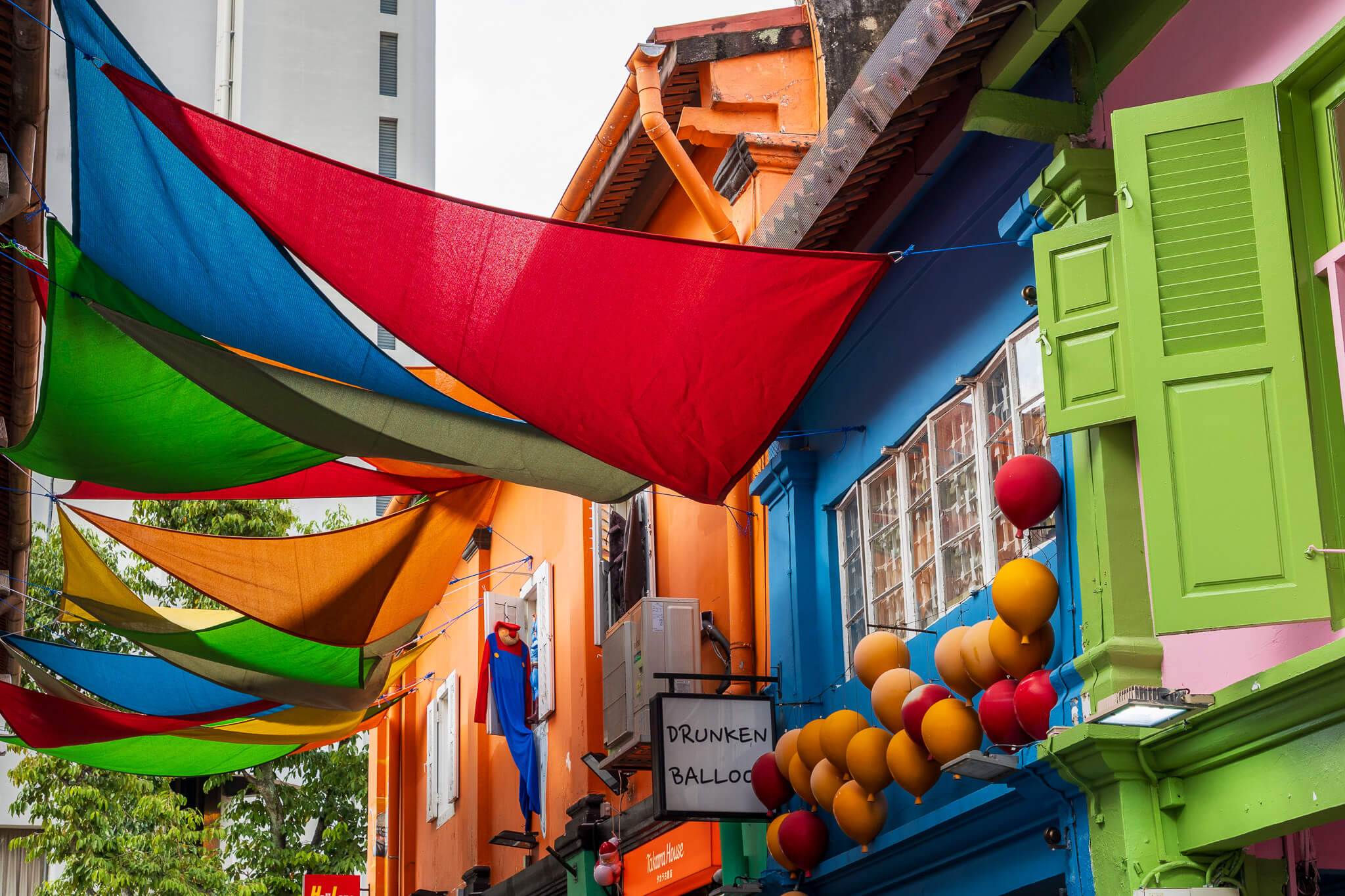 Colourful shophouses and fabric canopies on Haji Lane in the Arab Quarter, Singapore